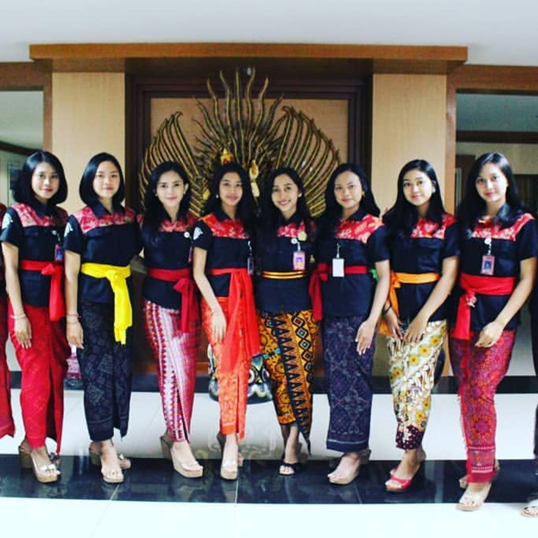 woman in red shirt wearing blue goggles