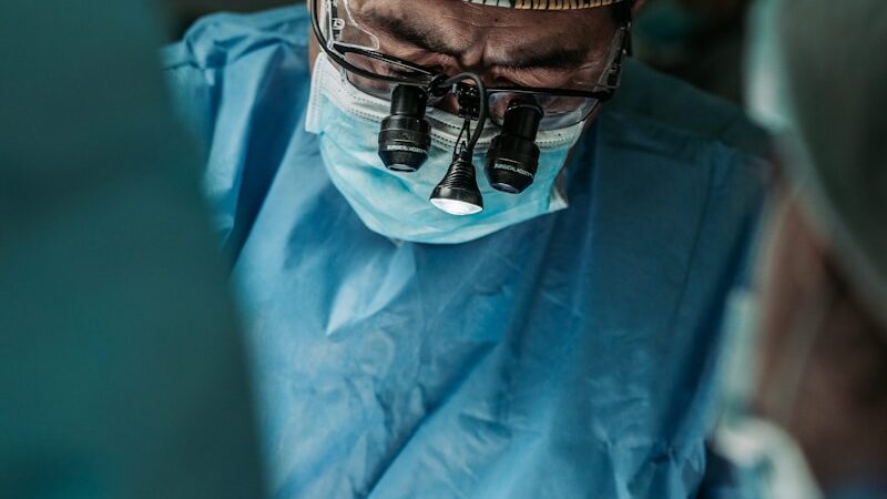 doctor wearing Green Bay Packers hat